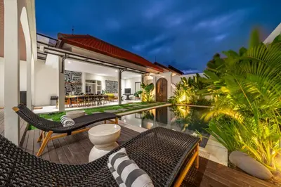 an image of a villa with a swimming pool at Alisa 4 - Luxurious 4BR Villa with Garden Views and Pool in Seminyak