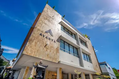 a building with aania sign on the side of it at Avanya Luxury Apartment by Pertama Management in Seminyak