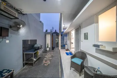 a hallway of a house with a living room at KUTA - 3 Bedroom Private Pool Villa on Jl Mataram! in Kuta