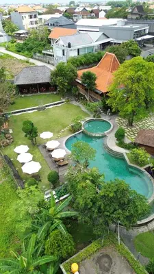 an aerial view of a resort with a swimming pool at Natajiwa Village close to Canggu and Seminyak in Seminyak
