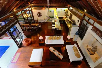an overhead view of a living room with tables and chairs at Villa Jepun Seminyak in Canggu