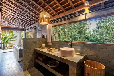 a bathroom with a sink and a large window at Villa Madah - Secluded & Romantic Retreat 1BR Near Umalas with Private Pool & View in Kerobokan