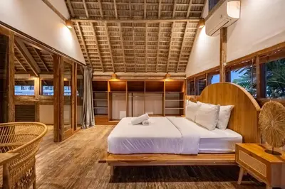 a bedroom with a bed in a room at Villa Vintage 3 in Canggu