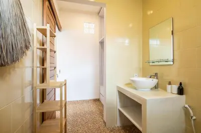 a bathroom with a sink and a mirror at Canggu - Villa Romy - 2 Bedrooms - Private Pool in Kerobokan