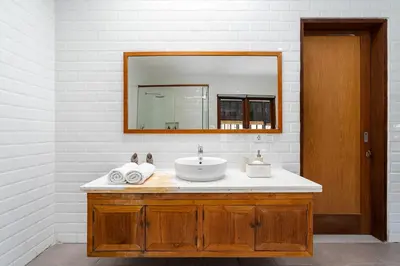 a bathroom with a sink and a mirror at Beta Stay and Surf in Canggu