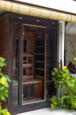 an open glass door on a house at Luxury 3-Bedroom Villa With Private Pool Seminyak Village in Seminyak