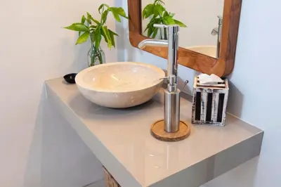 a bathroom counter with a sink and a mirror at COZY 2 BR Villa Private POOL walk to the beach in Badung
