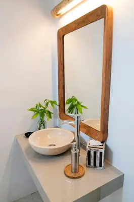a bathroom sink with a large mirror on a counter at COZY 2 BR Villa Private POOL walk to the beach in Badung