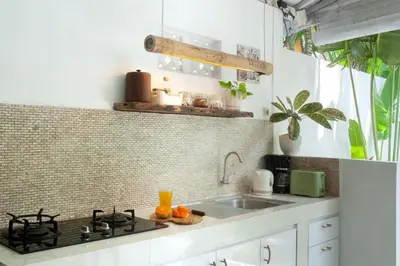 a kitchen with a stove and a sink at COZY 2 BR Villa Private POOL walk to the beach in Badung