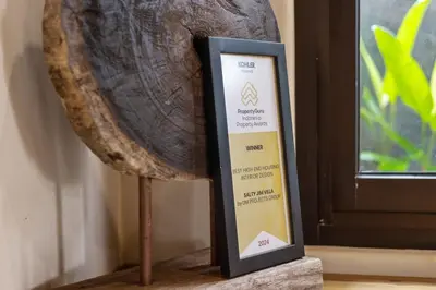 a sign on a stand next to a log at Brand New 4BR Villa with Pool, Sauna & Fire pit close to Nusa Dua and Uluwatu in Jimbaran