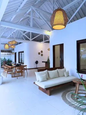 a living room with a couch and a tv at A strategic 2 bedroom villa in seminyak in Seminyak