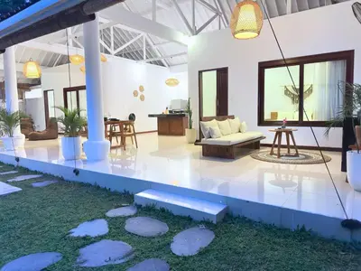 a living room with rocks in the grass at A strategic 2 bedroom villa in seminyak in Seminyak