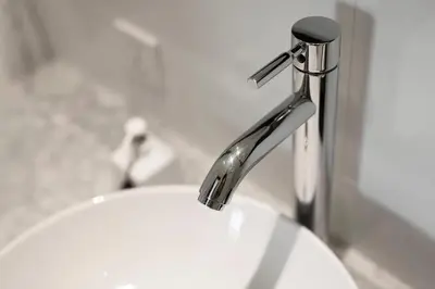 a bathroom sink with a chrome water faucet at Gorgeous 1 Bed Pool Villa, Walk to Beach, Shops in Seminyak