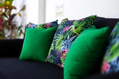 a group of pillows sitting on top of a couch at Gorgeous 1 Bed Pool Villa, Walk to Beach, Shops in Seminyak