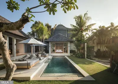 a pool in the backyard of a villa at Villa Massilia Bali in Seminyak