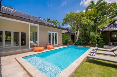 a swimming pool in the backyard of a villa at Villa Sitara, Sitara Villa Group in Seminyak