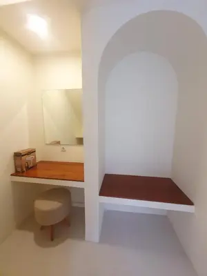 a small room with a desk and a stool at Villa Kiara Sanur in Sanur