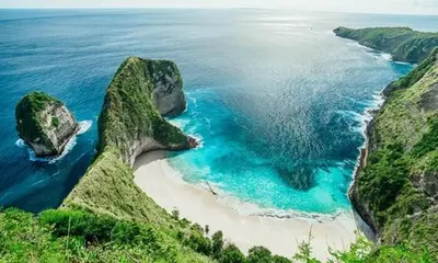 an aerial view of a beach with rocks in the ocean at 3BR Villa4 Oberoi Seminyak,18m walk to the beach in Seminyak
