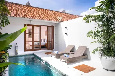 a pool in the backyard of a villa at Ti - 1BR pool villa in the heart of Seminyak in Seminyak
