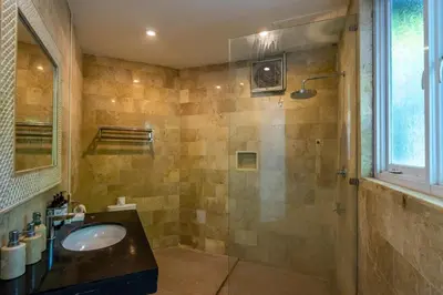 a bathroom with a sink and a shower at 2BR Villa walking distance to Finns & Atlas in Canggu