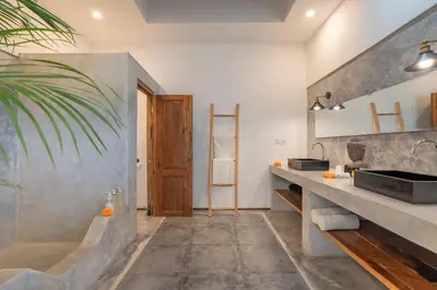 a bathroom with a sink and a counter top at Villa Wampu By DreamAwayBali in Seminyak