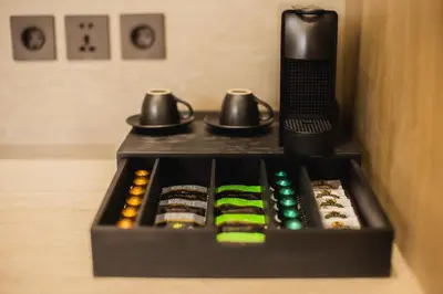 a black box filled with different colored remote controls at CAVO Villa in Seminyak