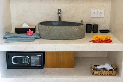 a counter top with a sink and a microwave at NEW! Villa Theo - 1BR Villa in Kerobokan in Seminyak