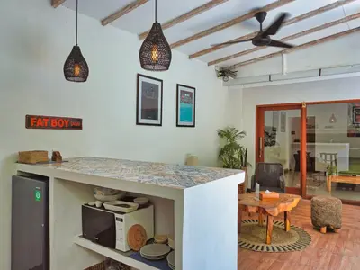 a kitchen with a counter top in a room at Villa Pastis Umalas #2, near Canggu in Canggu