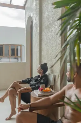 a group of people sitting around a table at Villa Viento Tropical Haven Canggu in Canggu