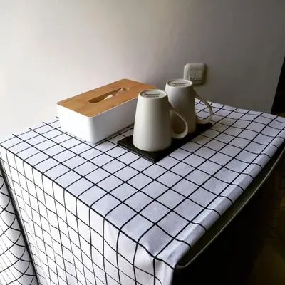 a counter top with two cups and a box on it at PalmA Private Villa - A Leafy Place in Mumbul Hill in Nusa Dua