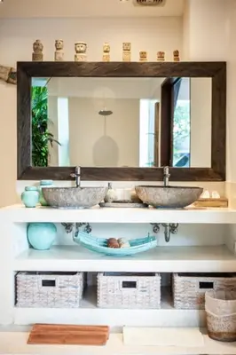 a bathroom with two sinks and a mirror at Bali paradise Rosa in Seminyak