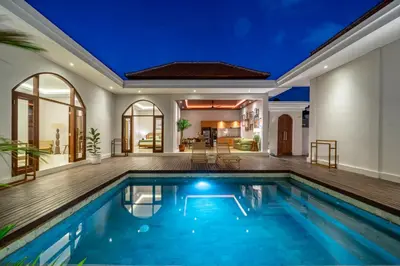 a swimming pool in a home with a house at Sunterra 2 - Bali Villa Dream with Huge Pool in Kerobokan