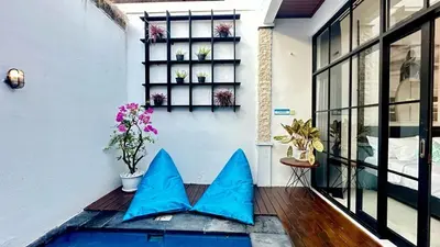 two blue butterflies sitting on the floor of a house at 2 Bedrooms Villa Petitenget Private Pool in Seminyak