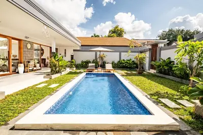 an image of a swimming pool in the backyard of a house at Brand new - spacious complex Villas Virland - center Seminyak in Seminyak