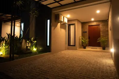 an empty hallway of a house at night at Modern tropical House Villa in Seminyak