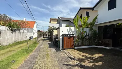 a rv parked in front of a house at Ambara Villa - Quiet Luxury in Umalas in Canggu