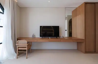 a television sitting on a desk in a room at Brand New Exquisite Luxury 5 BR Villa Umalas in Kerobokan