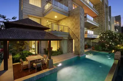 an image of a house with a swimming pool at Luxury Apartment at AYANA Residences in Jimbaran