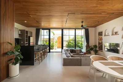 a living room with a couch and a table at Ben's Villa 1 by Alfred in Bali in Kerobokan