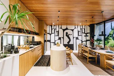 a kitchen and dining room with a table and chairs at Casa Ipanema, Luxury 2 Bedrooms Villa with Cinema in Private Quiet Area in Canggu