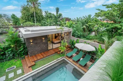 an aerial view of a villa with a swimming pool at The Plaza 4BR With Pool in Bali s Eat Street in Seminyak