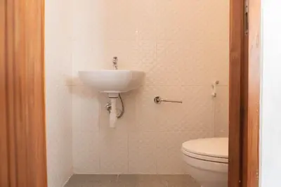 a bathroom with a sink and a toilet at NEW! Queen Villa - 2BR Villa in Seminyak in Seminyak