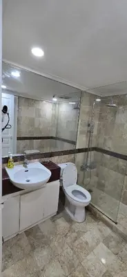 a bathroom with a toilet and a sink and a shower at The Palmana Tropical Garden Jayakarta Residence 36 in Seminyak