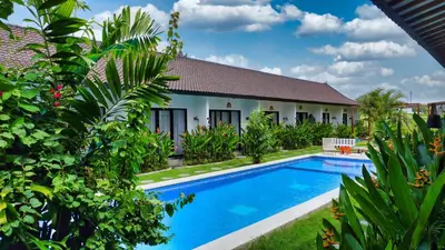 an image of a villa with a swimming pool at Mistral Studio Umalas in Canggu