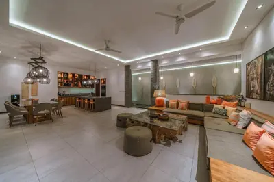 a large living room with a couch and a table at PROMO - 4 Bedroom Designer Villa 2 minutes to Berawa Beach & Finns in Canggu