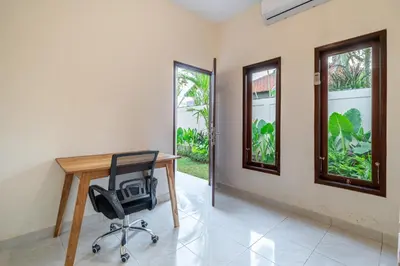 an empty office with a desk and a chair at Alicia - Stylish 2BR Villa with Large Pool in Kerobokan