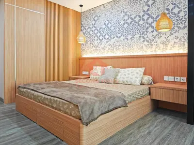 a bedroom with a bed with two pillows on it at Lavaya Resort 1BR Nusa Dua with Pool, WiFi, Netflix by 2ndHome in Nusa Dua