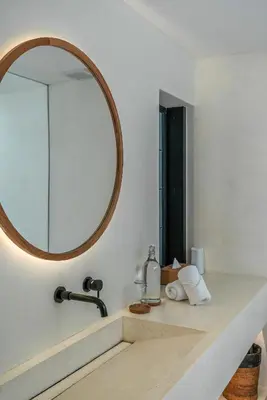 a bathroom with a sink and a mirror at Villa Luuma 3 - Cozy Umalas Oasis, 1BR Private Villa in Canggu
