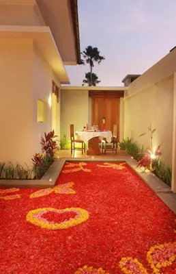 a large red rug with the number on it at Maharaja Villas Seminyak by Humus Hospitality in Kerobokan