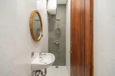 a bathroom with a sink and a mirror at A26 - Private Pool Villa in Seminyak in Seminyak